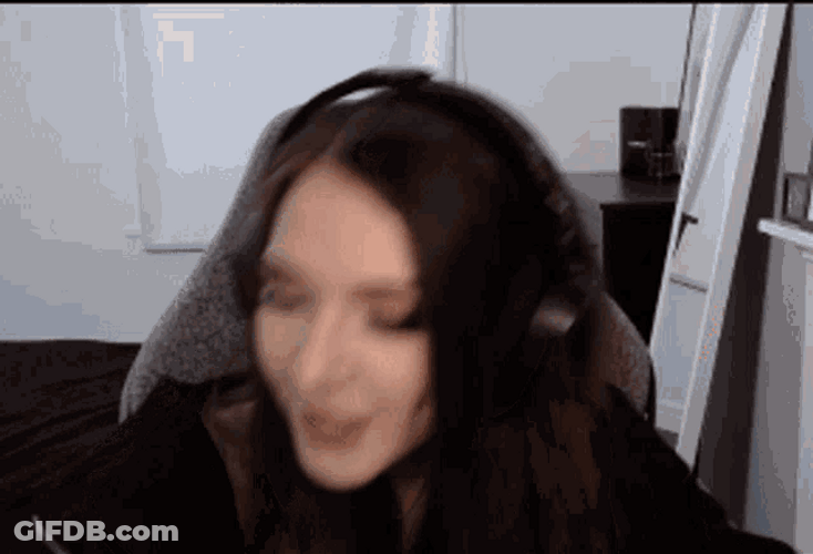 Streamer Holding Uno Reverse Cards GIF