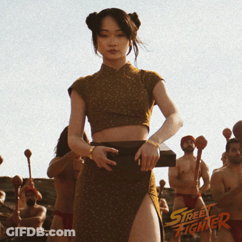 Street Fighter Poster Woman In Crop Top And Skirt GIF