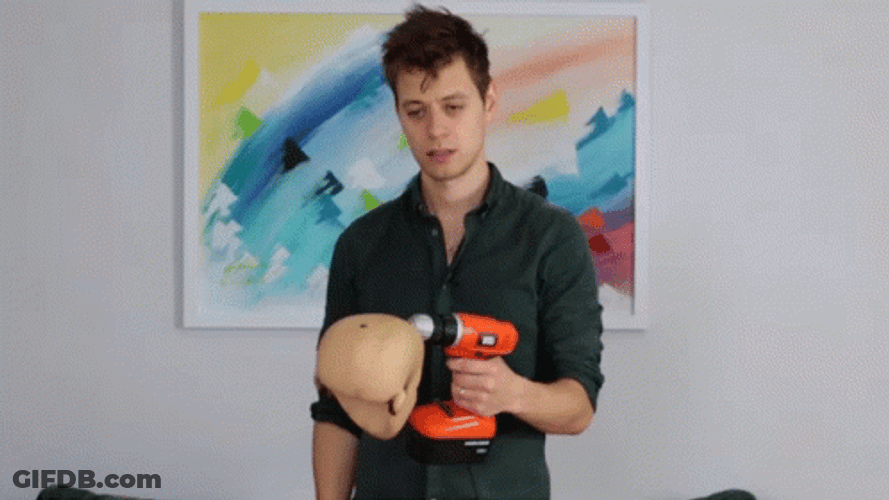 Stressed Guy Holding Black Decker Drill GIF