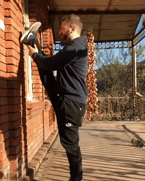 Stretching Leg Funny GIF