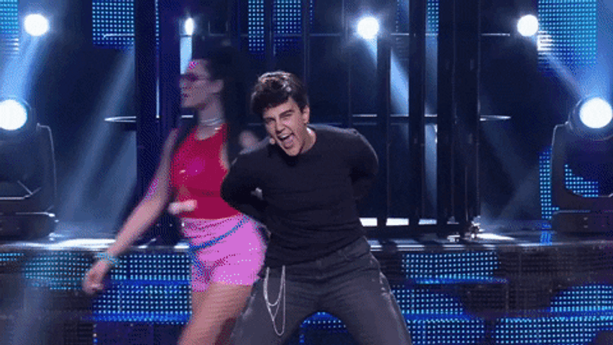 Strip Tease Robbie Williams GIF