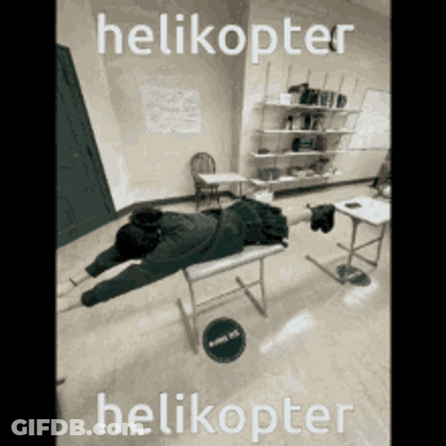 Student Doing Helicopter Spin Classroom Desk GIF