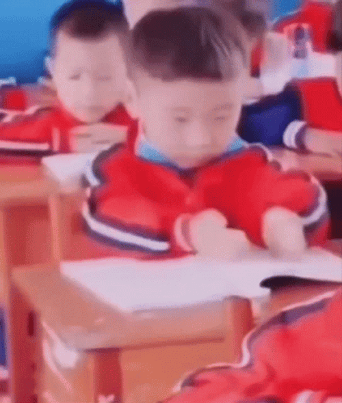 Student Scooping Knowledge From Book GIF