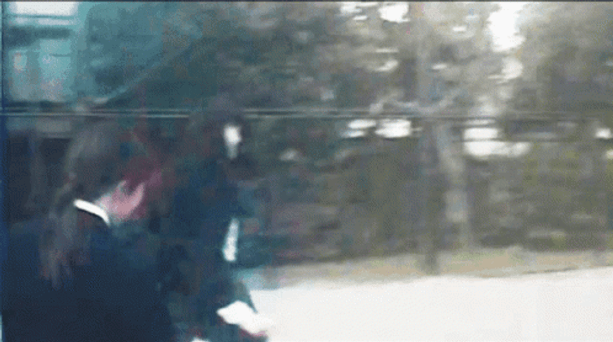 Students In An Intense School Fight GIF