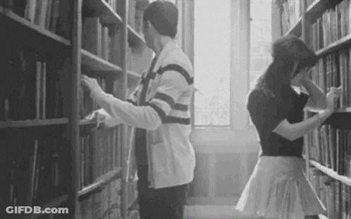 Students Passionate Kissing At The Library GIF