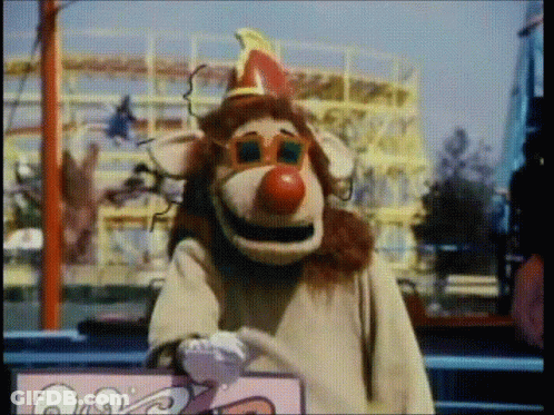 Stuffed Animal Clown Holding O Sign GIF