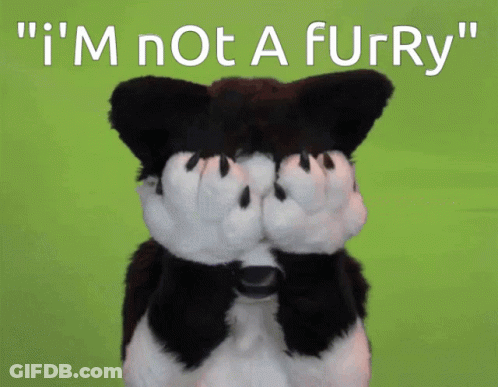 Stuffed Animal Covering Eyes Saying Im Not A Furry GIF
