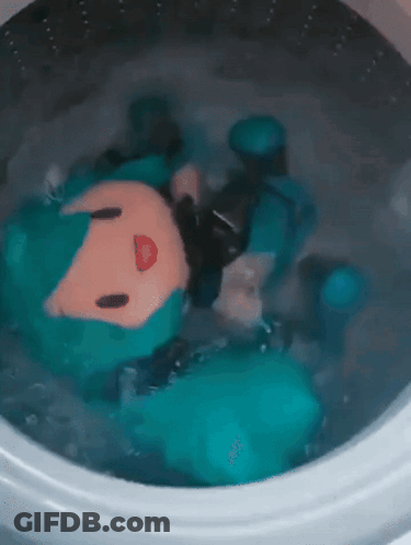 Stuffed Animal Floating In Washing Machine GIF