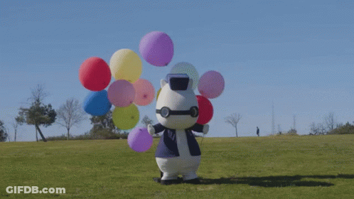 Stuffed Animal Holding Balloons GIF