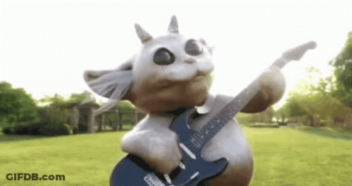 Stuffed Animal Holding Guitar In Park GIF