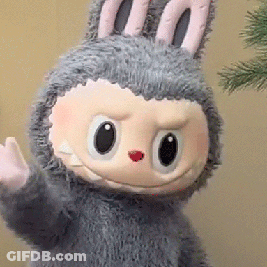 Stuffed Animal In Bunny Costume Waving GIF