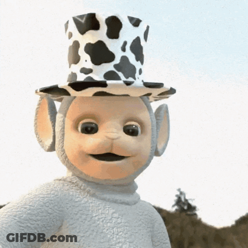 Stuffed Animal In Cow Print Top Hat GIF