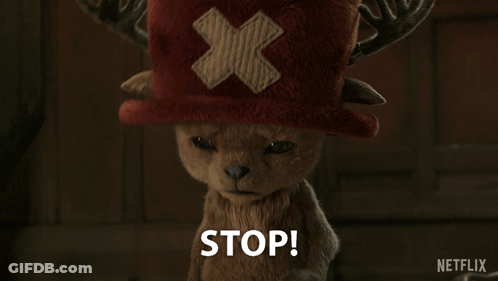 Stuffed Animal In Red Hat Saying Stop GIF