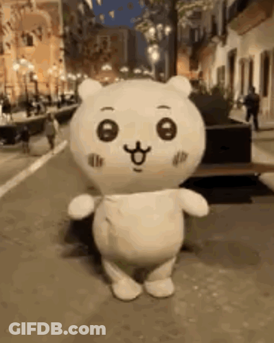 Stuffed Animal Mascot On City Street GIF