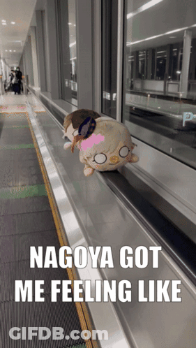 Stuffed Animal On Escalator Nagoya Feeling GIF