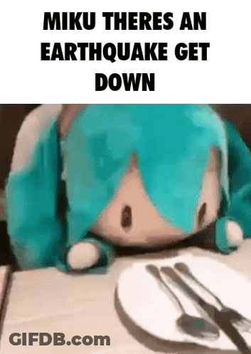Stuffed Animal Sitting At Table With Plate And Silverware GIF