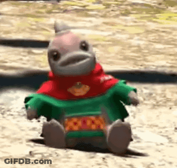 Stuffed Animal Sitting In Sweater GIF