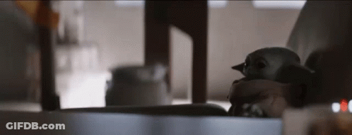 Stuffed Animal Sitting On Table GIF