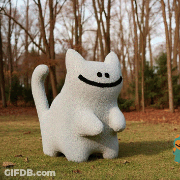Stuffed Animal Smiling In A Field GIF