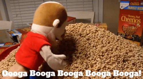 Stuffed Animal Standing On Cheerios GIF