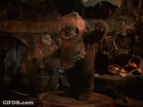 Stuffed Animal Standing On Stump In Cave GIF