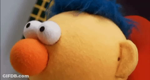 Stuffed Animal With Big Eyes And Blue Hair GIF