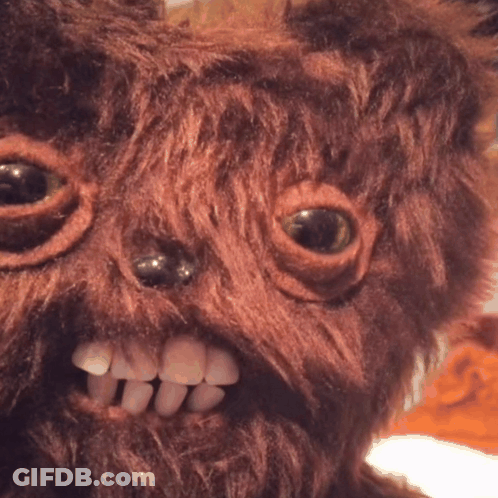 Stuffed Animal With Big Eyes Close Up GIF