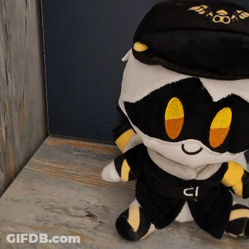 Stuffed Animal With Black Hat And Belt With CI GIF