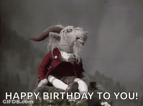 Stuffed Animal With Horns And Beard Saying Happy Birthday GIF
