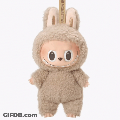 Stuffed Animal With Man's Face Saying Monsters GIF
