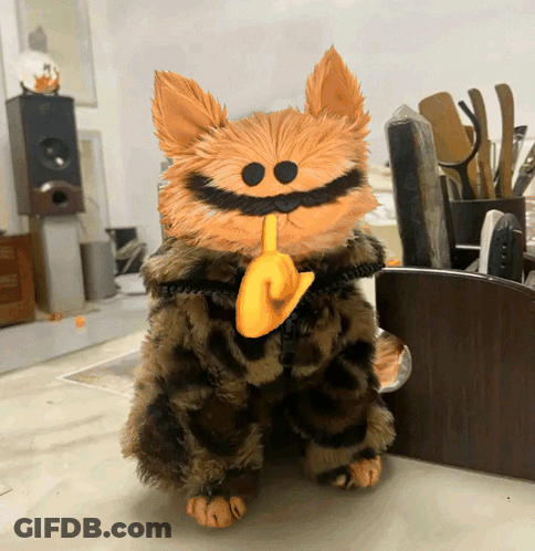 Stuffed Animal With Mustache And Yellow Finger On Mouth GIF