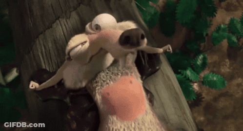 Stuffed Animal With Pink Belly Laying On Ground GIF