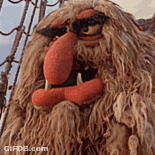 Stuffed Animal With Red Nose And Teeth GIF