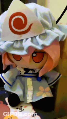 Stuffed Animal With White Hat And Red Swirl GIF