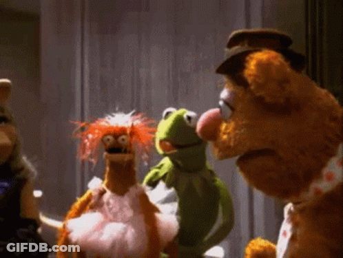 Stuffed Animals Including Kermit The Frog Standing Together GIF