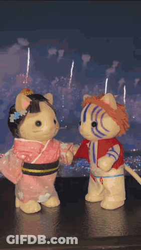 Stuffed Animals Next To Fireworks GIF