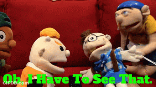 Stuffed Animals On Red Couch Saying Oh I Have To See That GIF
