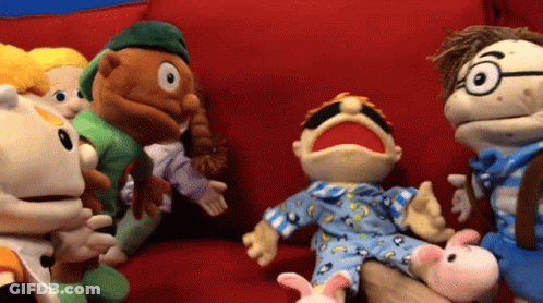 Stuffed Animals Sitting On Couch GIF