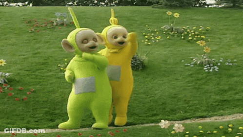 Stuffed Animals Standing In A Field GIF