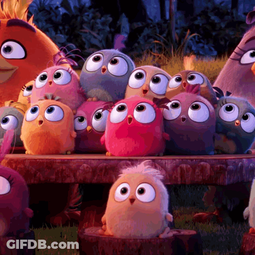 Stuffed Birds Sitting On Wooden Bench GIF