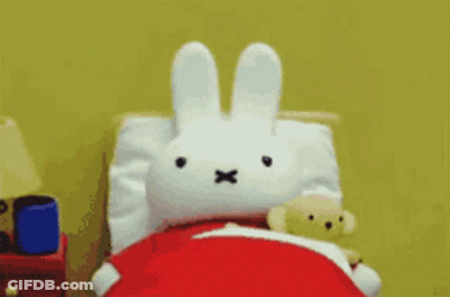 Stuffed Bunny And Teddy Bear In Bed GIF