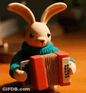 Stuffed Bunny Holding Accordion GIF
