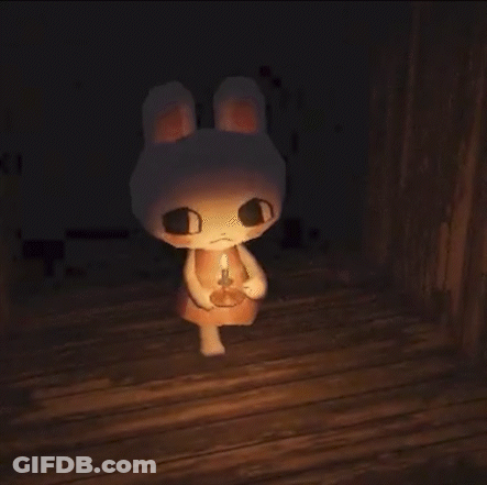 Stuffed Bunny Rabbit Holding Candle In Dark Room GIF