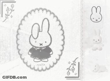 Stuffed Bunny With Cross In Hand GIF