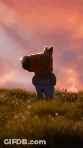 Stuffed Dog Head Standing In Grass GIF