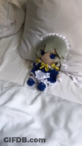 Stuffed Doll In Maid Outfit On Bed GIF
