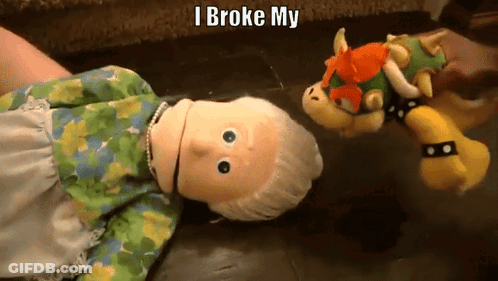 Stuffed Doll Laying On Couch Next To Stuffed Animal Saying I Broke My GIF