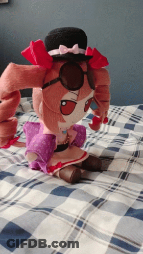 Stuffed Doll Wearing Hat And Sunglasses GIF