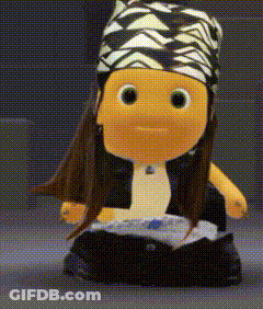 Stuffed Doll With Bandana And Black Vest GIF