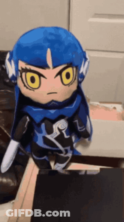 Stuffed Doll With Blue Hair And Yellow Eyes GIF